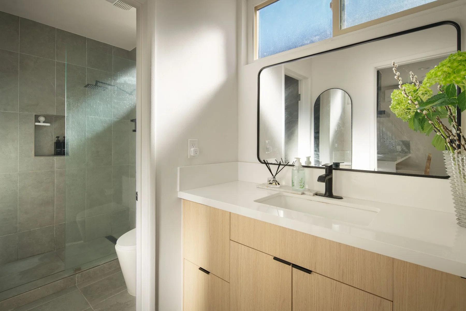 Renovated bathroom with walk-in shower